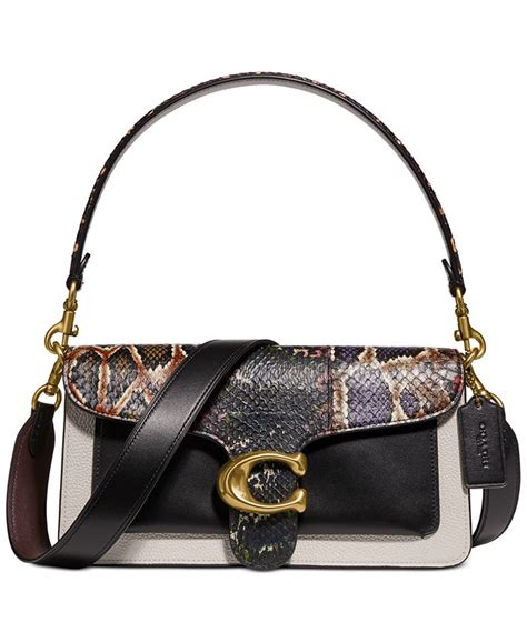 A modernday icon with sleek hardware and a fresh take on our turnlock closure, this versatile colorblock refined leather shoulder bag with luxe genuine snakeskin trim has interior multifunction pockets for easy organization and an outside slip pocket for. . Coach snakeskin shoulder bag